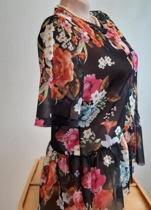 Яркая полупрозрачная блуза с баской размер 144 фото
