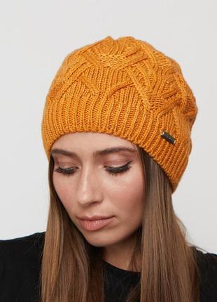 Жіноча зимова шапка на флісі2 фото