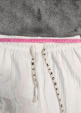 Женские широкие брюки на завязках с завышенной талией5 фото
