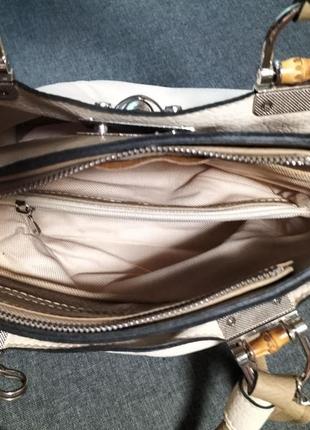Стильна жіноча сумочка колір бежевий, коричневий..8 фото