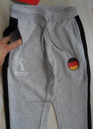 Нові щільні спортивні штани на флісі fifa німеччина,р.122-128см., маломірять на 116-122, див.заміри2 фото