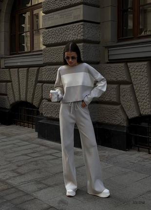 Женский серый современный трендовый костюм весна 2023 года осень