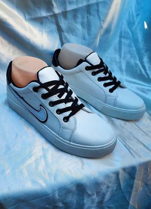 Подростковые белые кроссовки в стиле известного бренда nike6 фото