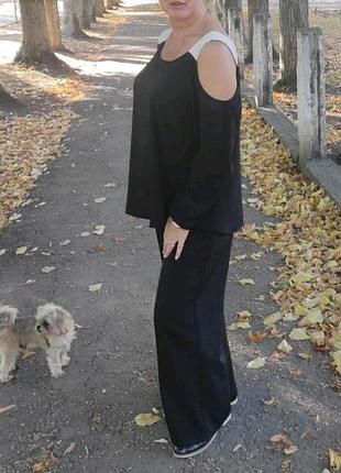 Стильна блуза на лямках і зі спущеними рукавами від бренда celect