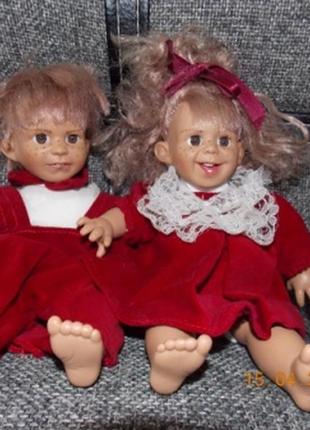 Парочка в червоному вбранні 25 см.90гг.германія-(за 2 шт.).характерні ляльки.