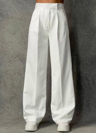 Найтрендові брюки кльош у топових кольорах брюки штаны клеш молоко беж черный серый1 фото