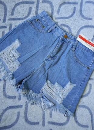 Женские джинсовые шорты с рваными краями голубые м2 фото