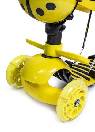 Трехколесный самокат scooter "божья коровка" 5в1 жёлтого цвета с родительской ручкой3 фото