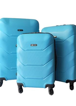 Набір валіз fly 2019 abs пластик 4-колеса набір 3шт l/m/s блакитний