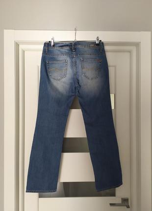 Синие, прямые, классические джинсы2 фото