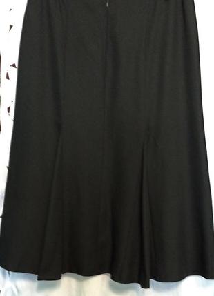 Весенняя черная женская юбка больших размеров.5 фото