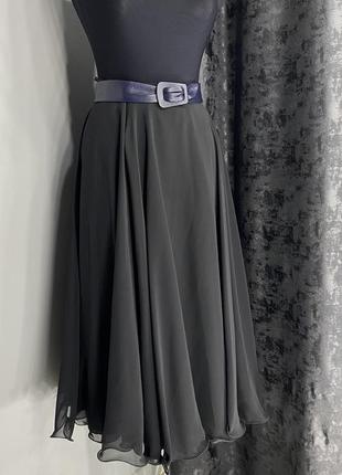 Черная юбка миди с фигурным низом4 фото