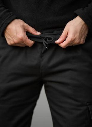 Теплі штани карго на флісі з кишенями чорні5 фото
