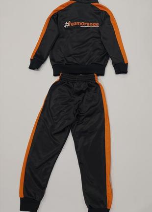 Стильный спортивный костюм  на флисе мальчику черный с оранжевым 3-4 года5 фото