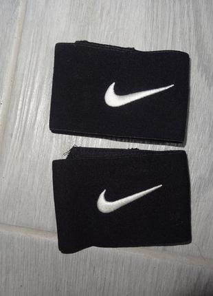 Держатели щитков nike1 фото