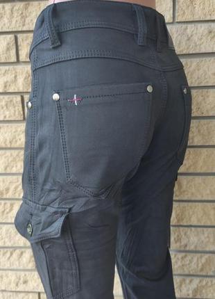 Женские зимние джинсы на флисе с накладніми карманами "карго" стрейчевые fangsida, турция10 фото