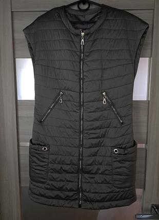 Жилетка