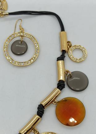 Набор комплект женской бижутерии ожерелье и сережки из золотистого металла с камнями6 фото
