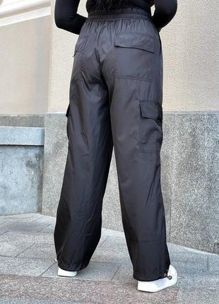 Штаны карго спортивные штаны с карманами на резинке штанины на затяжках прямые джоггеры палаццо батал большого размера штаны из плащёвки мокко черные6 фото