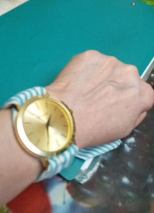 Женские наручные часы. ремешок: ткань. кварцевый циферблат, корпус сплав. длина 33см. абсолютно новая,100%качество4 фото