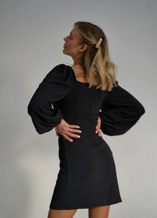 Платье мини с объемным рукавом3 фото