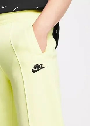 Спортивні штани nike club joggers in light zitron2 фото