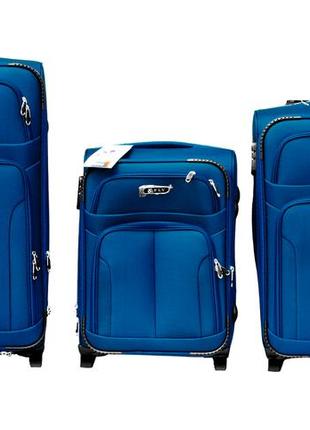 Тканинні дорожні валізи на 2 колеса fly 8303 набір із 3 штук синього кольору1 фото