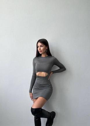 Элегантное платье с вырезом на талии короткое с рукавами по фигуре женственное6 фото