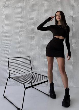 Элегантное платье с вырезом на талии короткое с рукавами по фигуре женственное4 фото