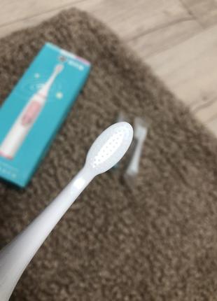 Електрична зубна щітка5 фото
