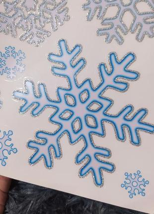 Багаторазові великі силіконові наліпки сніжинки з глітером на вікно новорічні деклр вікон5 фото