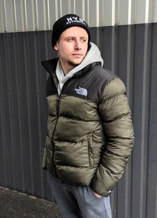 Зимовий пуховик tnf