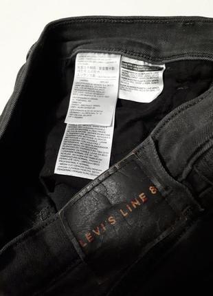 Сірі стрейчеві вузькі джинси levi's p 103 фото