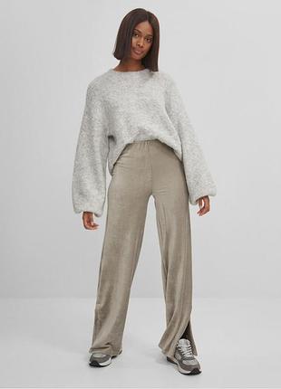 Штани знизу з розрізом палаццо bershka