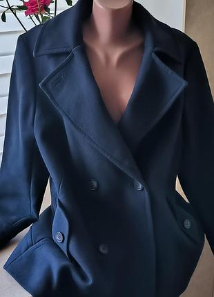 Расклешонное полупальто синего цвета