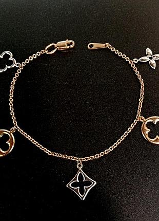 Золотой декоративный браслет с подвесками