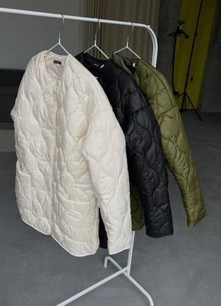 Удлиненная куртка свободного кроя стеганая плащевка на силиконе и подкладке с карманами на пуговицах6 фото
