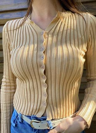 Гольф в рубчик с пуговицами