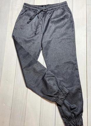 Темно-сірі брюки.4 фото