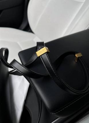 Брендова жіноча сумка, шкіряна чорного кольору6 фото