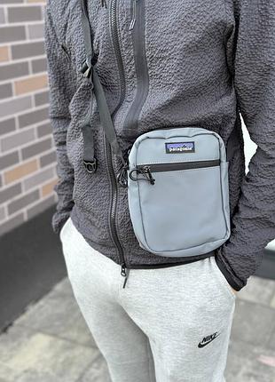 Барсетка patagonia серая сумка через плечо мужская / женская