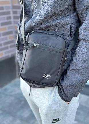 Барсетка arcteryx черная сумка через плечо женская / мужская