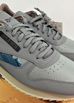 Оригинальные кроссовки reebok jurassic world classic leather ripple grey hq62535 фото