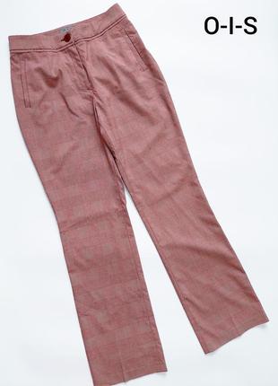 Жіночі світло бордові брюки в клітинку з кишенями від бренду o-i-s
