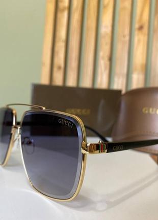 Солнцезащитные очки gucci2 фото