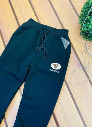 Шикарные теплые спортивные штаны на манжетах без карманов супер качество носятся рекомендация!!!!2 фото