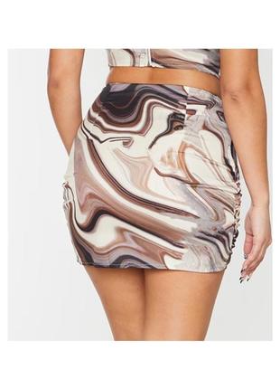 Актуальная юбка мини, в мраморный принт, стильная, модная, трендовая2 фото