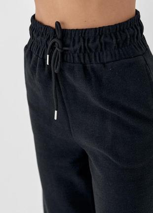 Жіночі брюки-кюлоти з високою талією9 фото