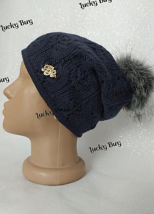 Женская шапка с бубоном
