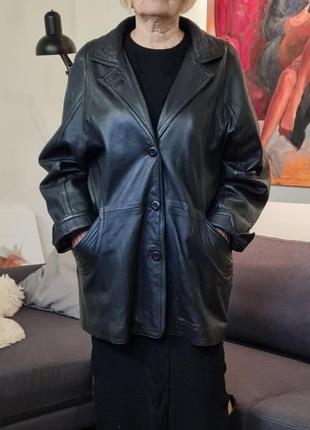 Шкіряна куртка до середини стегна натуральної шкіри жіноча чорна3 фото